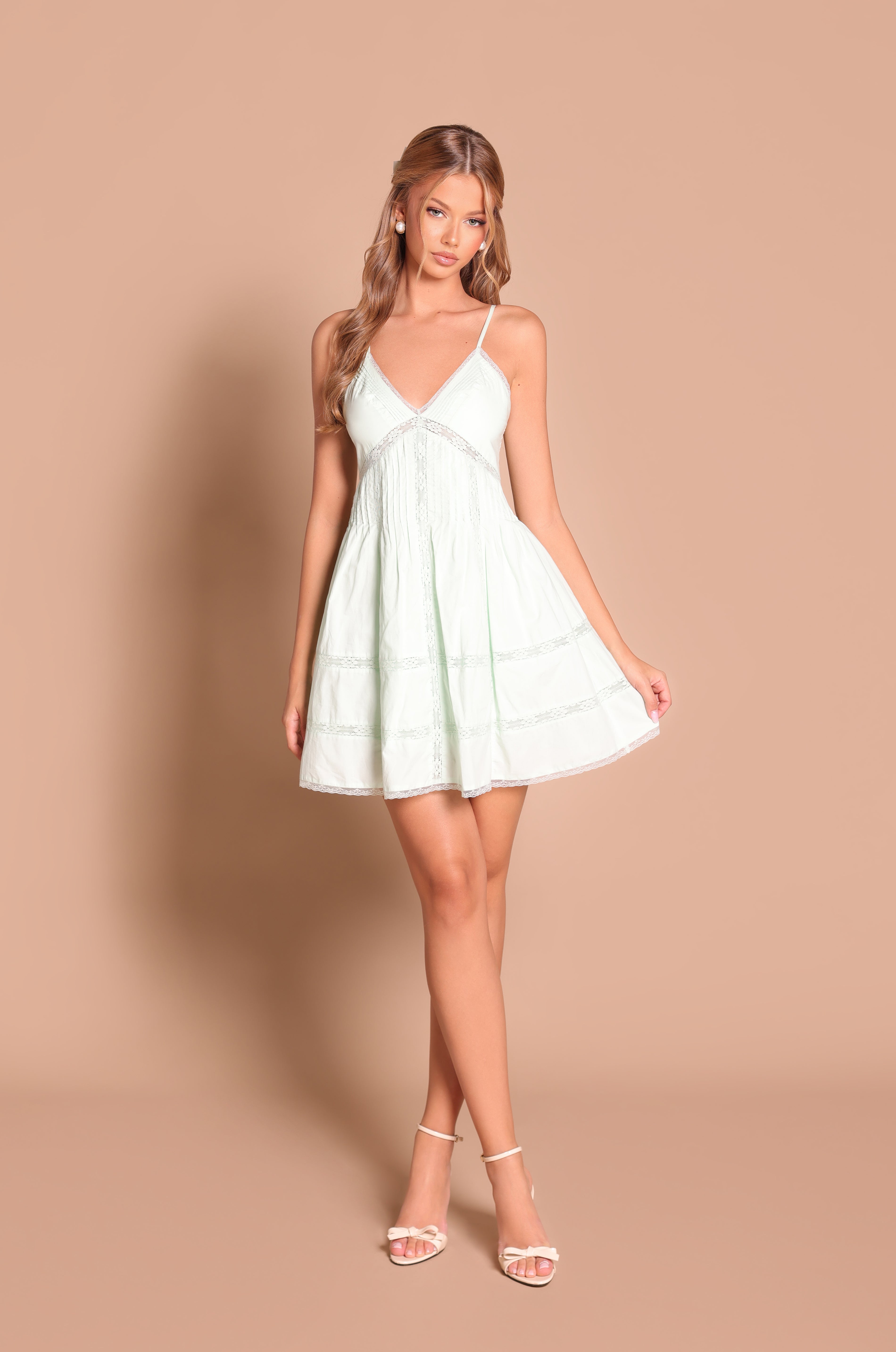 Mint green lace-trim mini sundress with thin straps