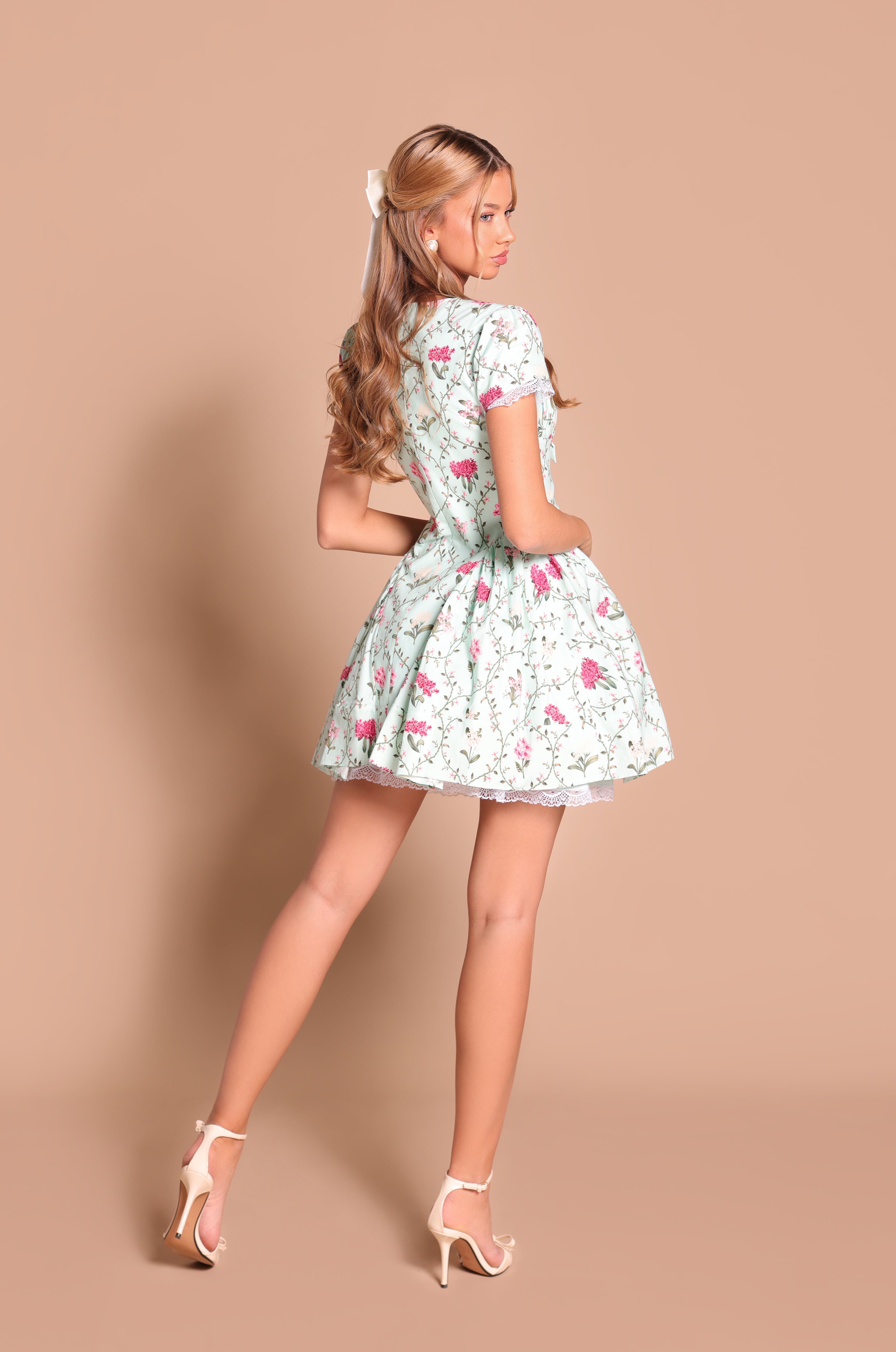 Mint green floral short-sleeve mini dress with bow front