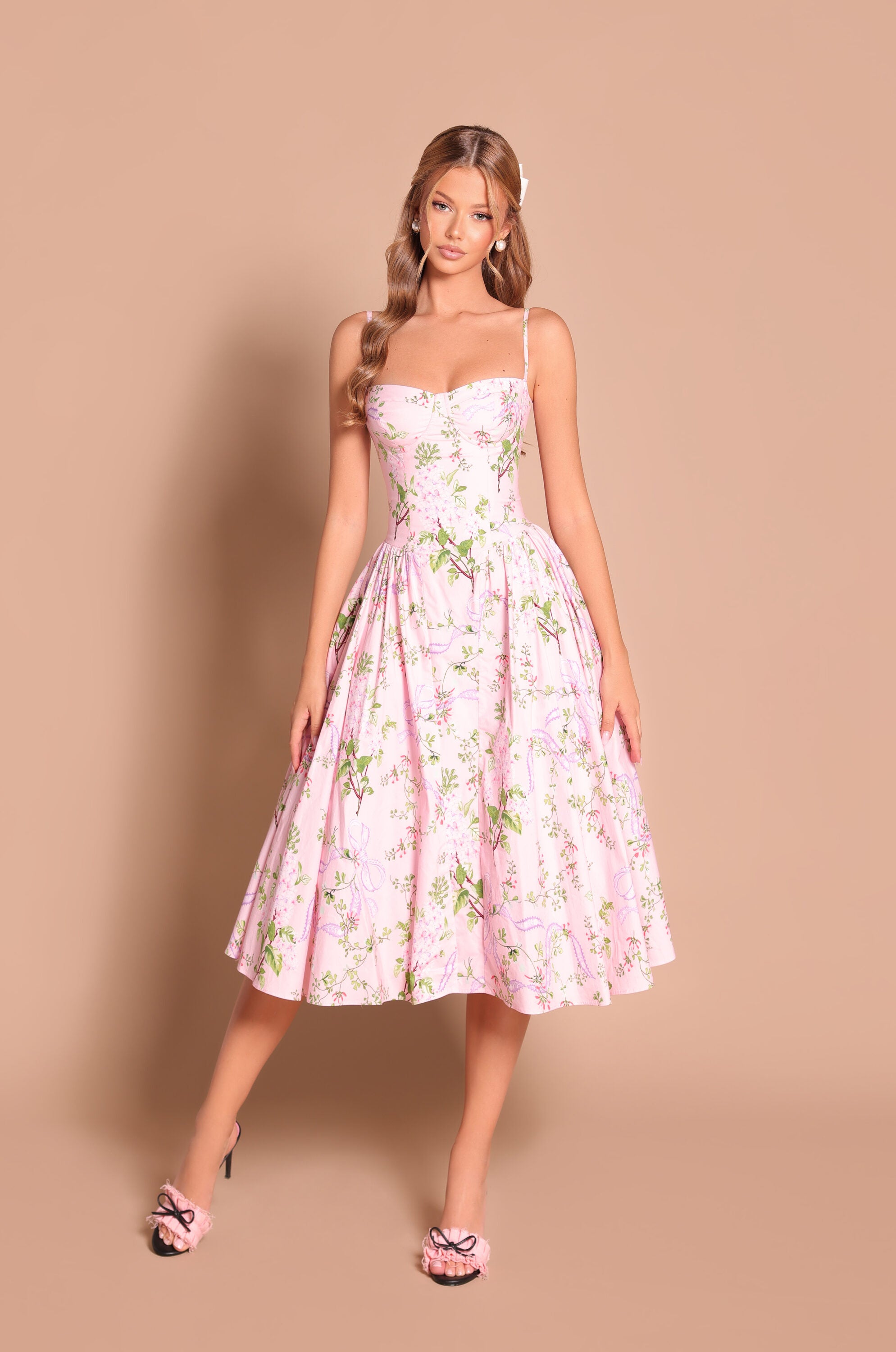 Blush pink floral corset midi dress with spaghetti straps