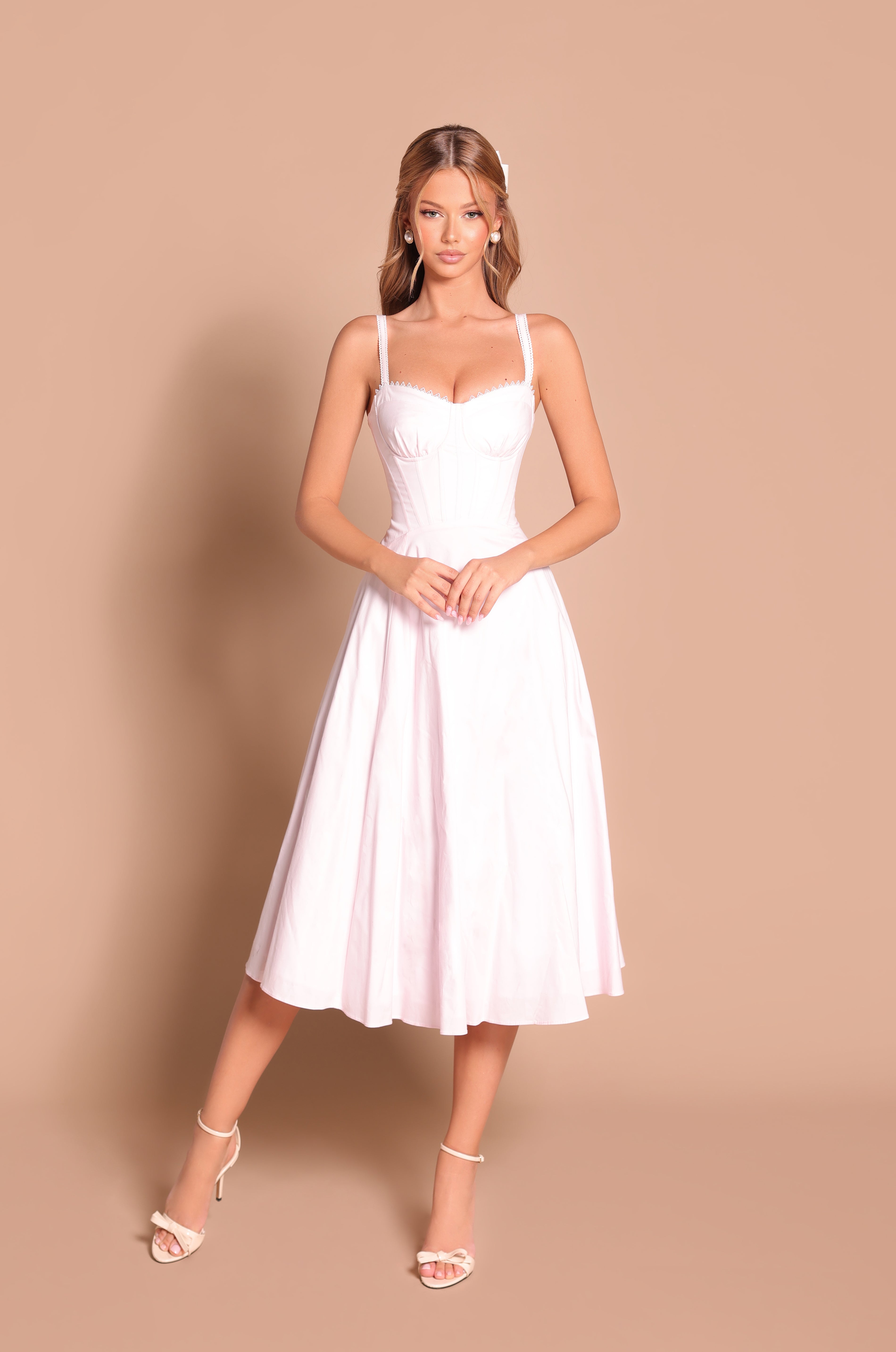 Primrose pink corset midi dress with sweetheart neckline