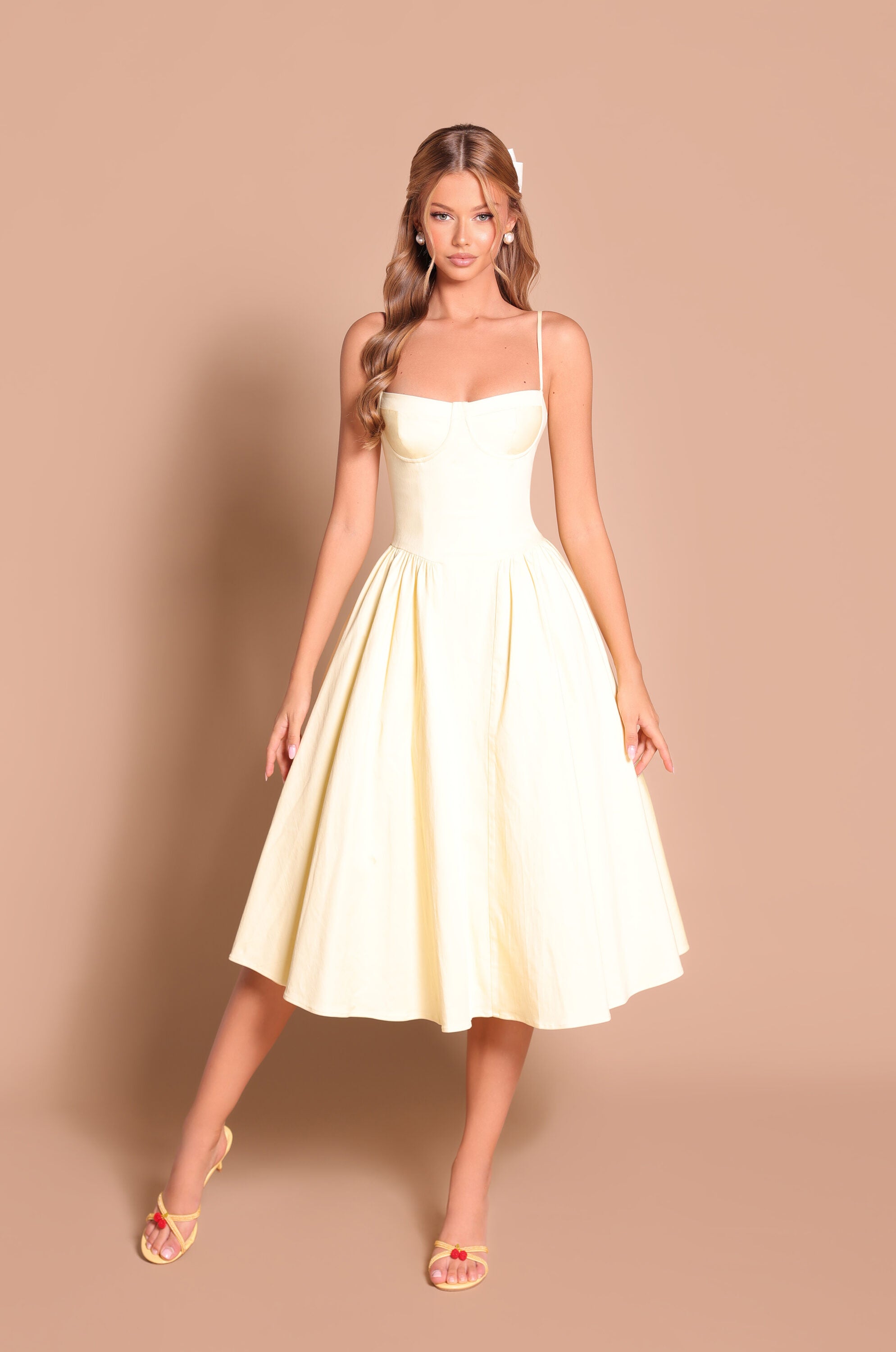 Buttercream yellow corset midi dress with sweetheart neckline