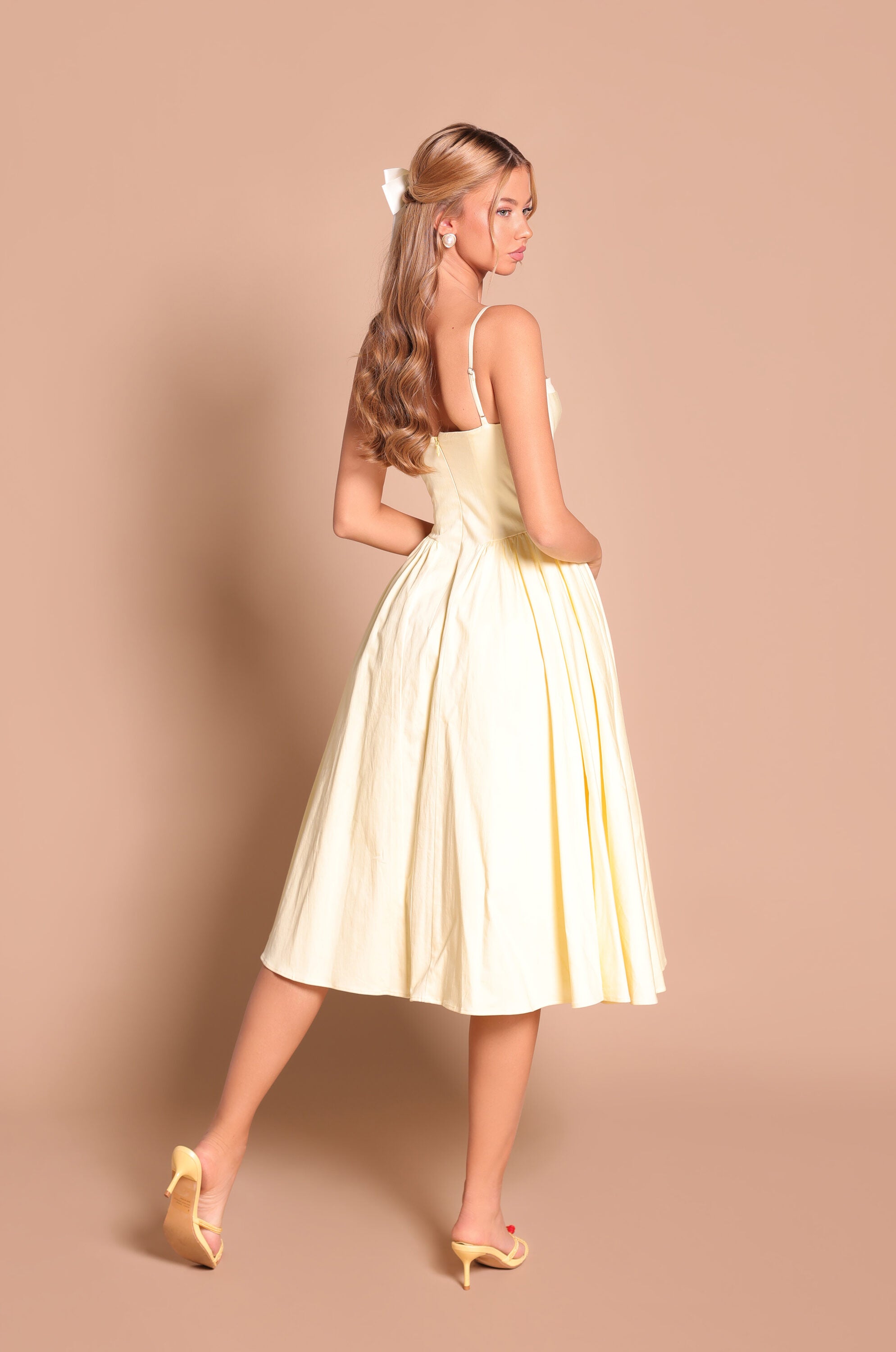 Buttercream yellow corset midi dress with sweetheart neckline