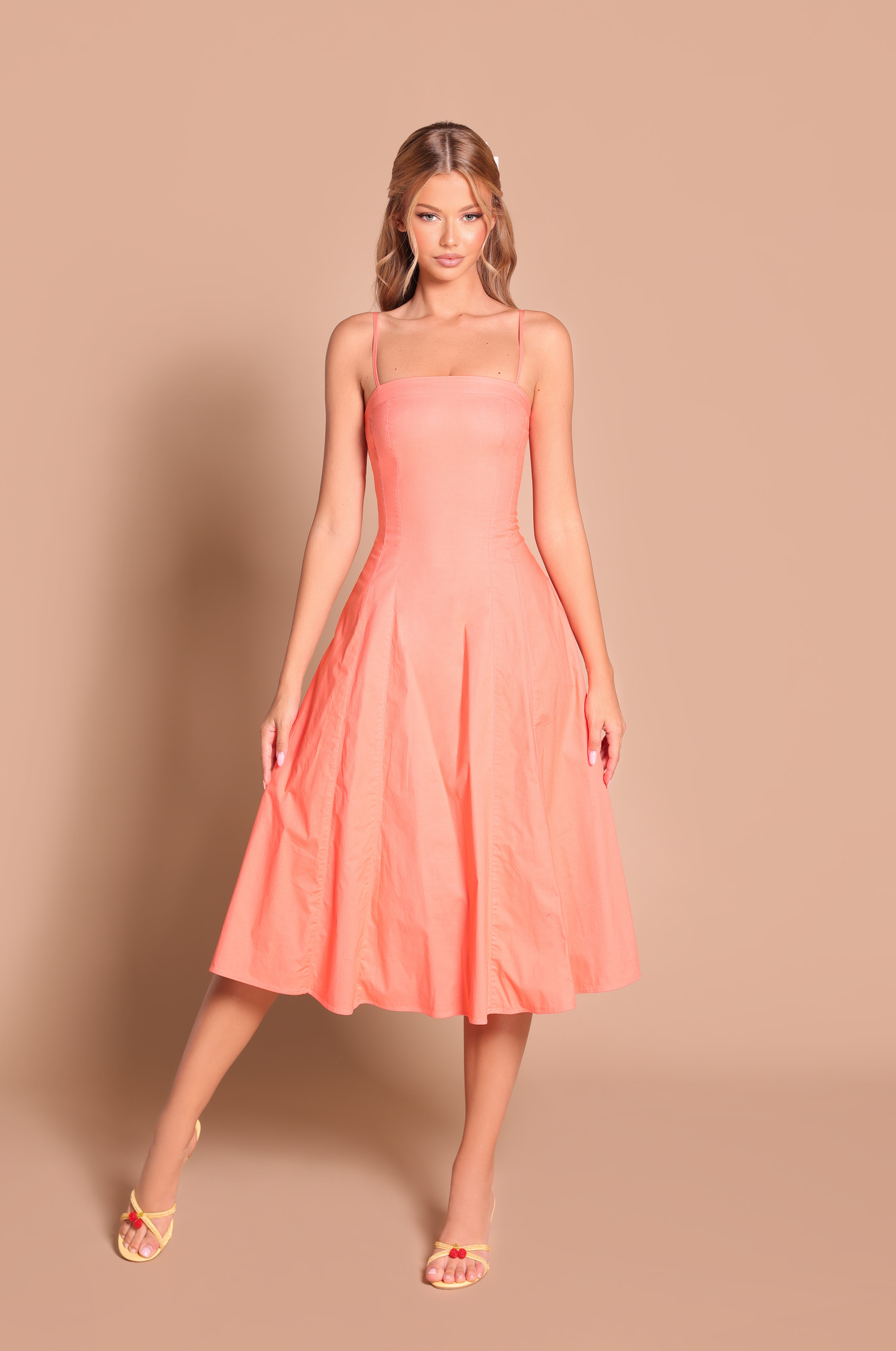 Solid papaya punch square-neck midi dress with pockets