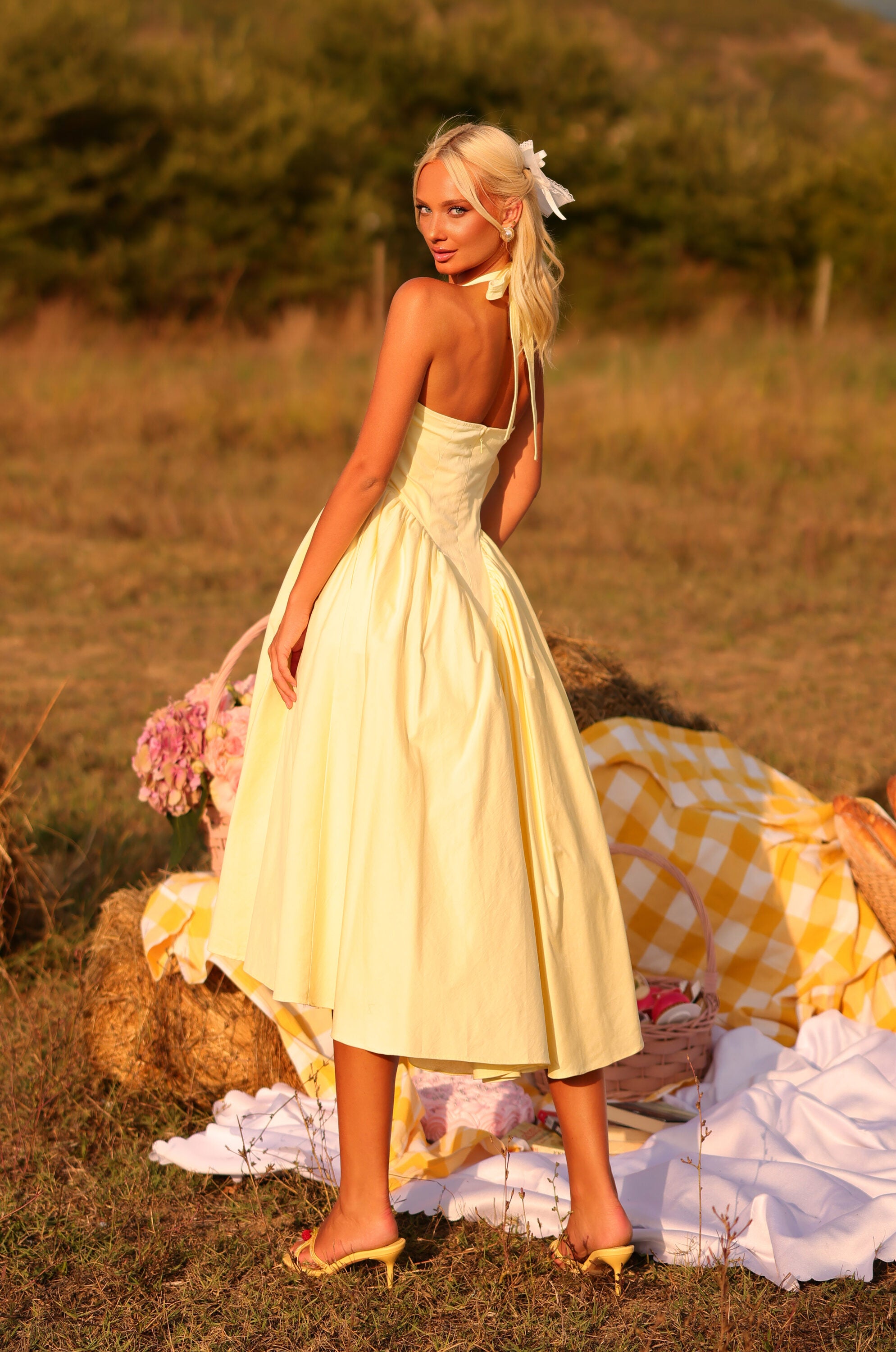 Buttercream Yellow halter midi dress with fitted waist 