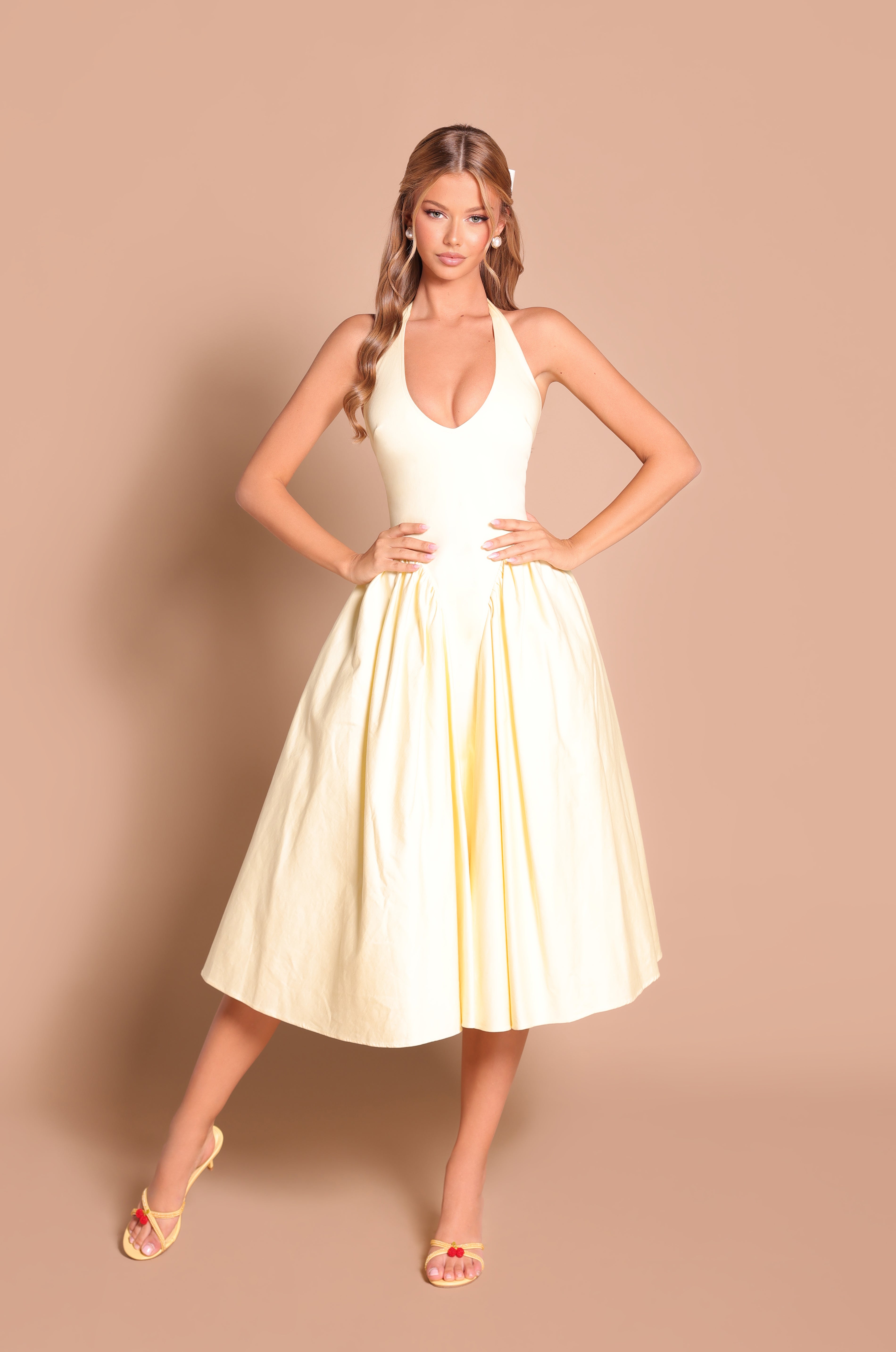 Buttercream Yellow halter midi dress with fitted waist 