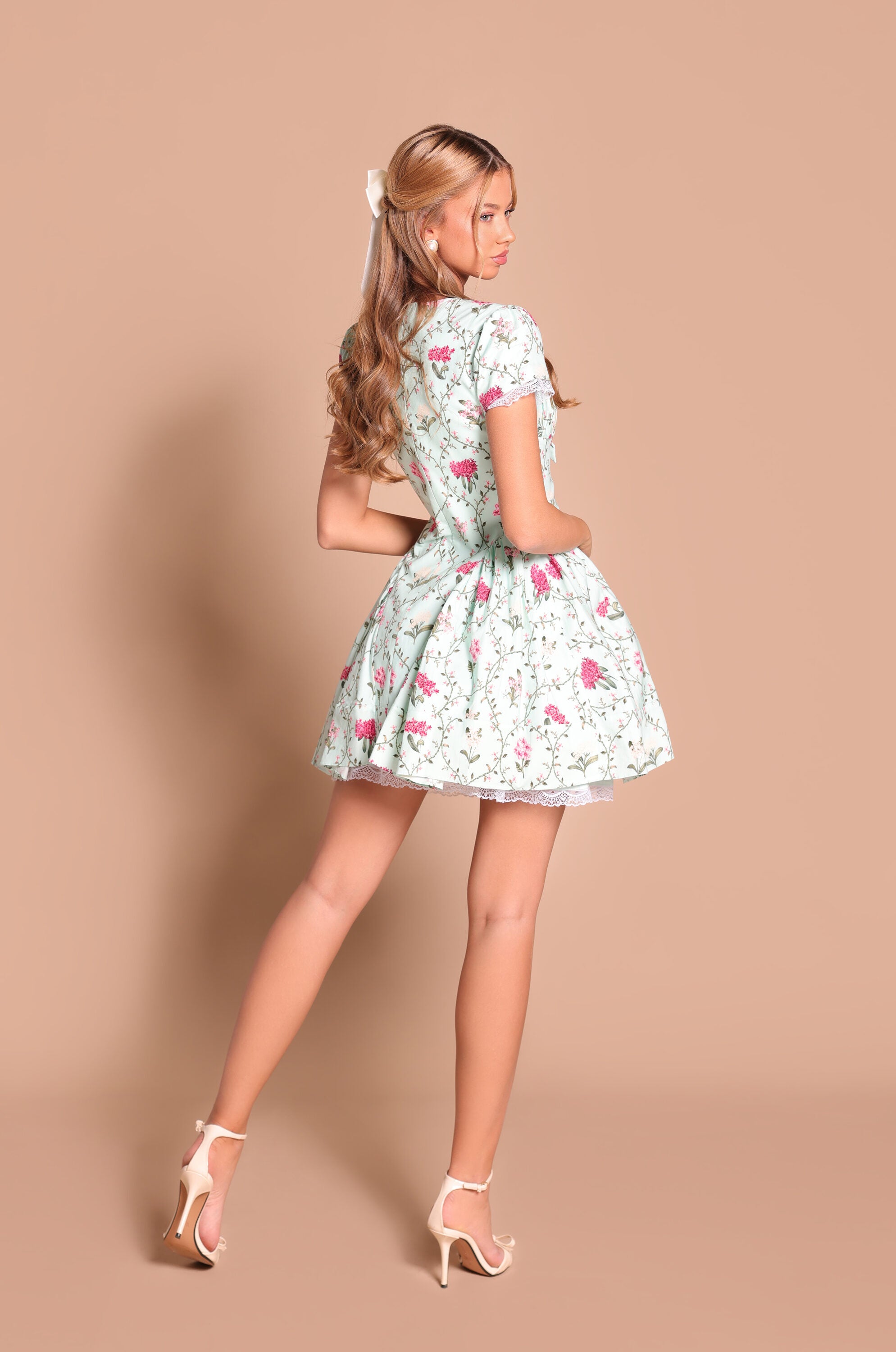 Mint green floral short-sleeve mini dress with bow front 