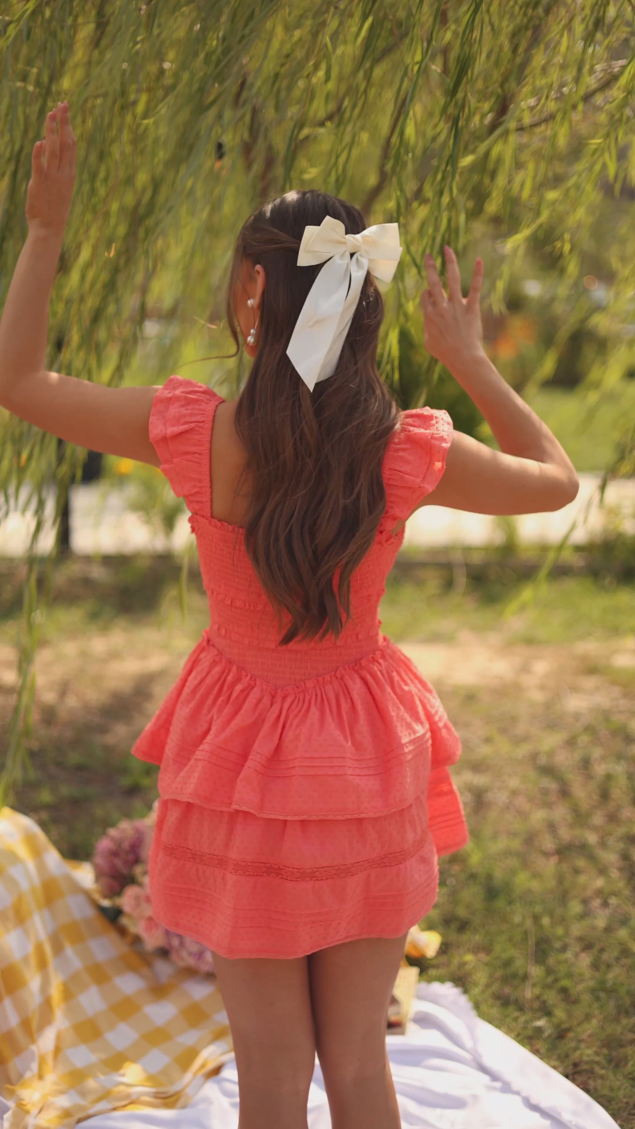 Coral-Orange ruffle mini dress with smocked bodice 