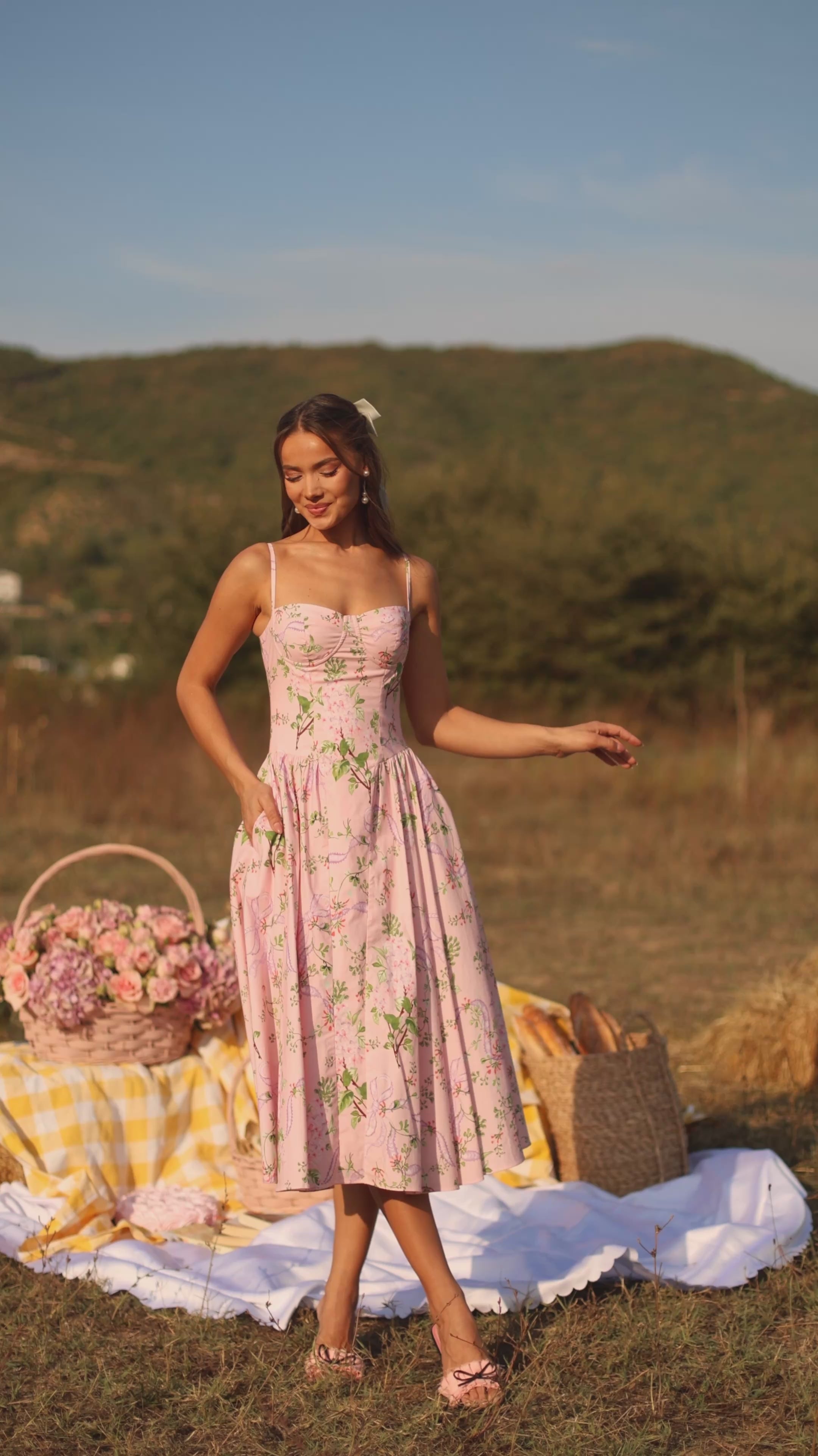 Blush pink floral corset midi dress with spaghetti straps 