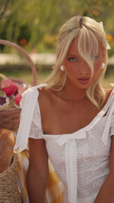 Ivory Candy puff-sleeve ruffle mini dress with bow front 