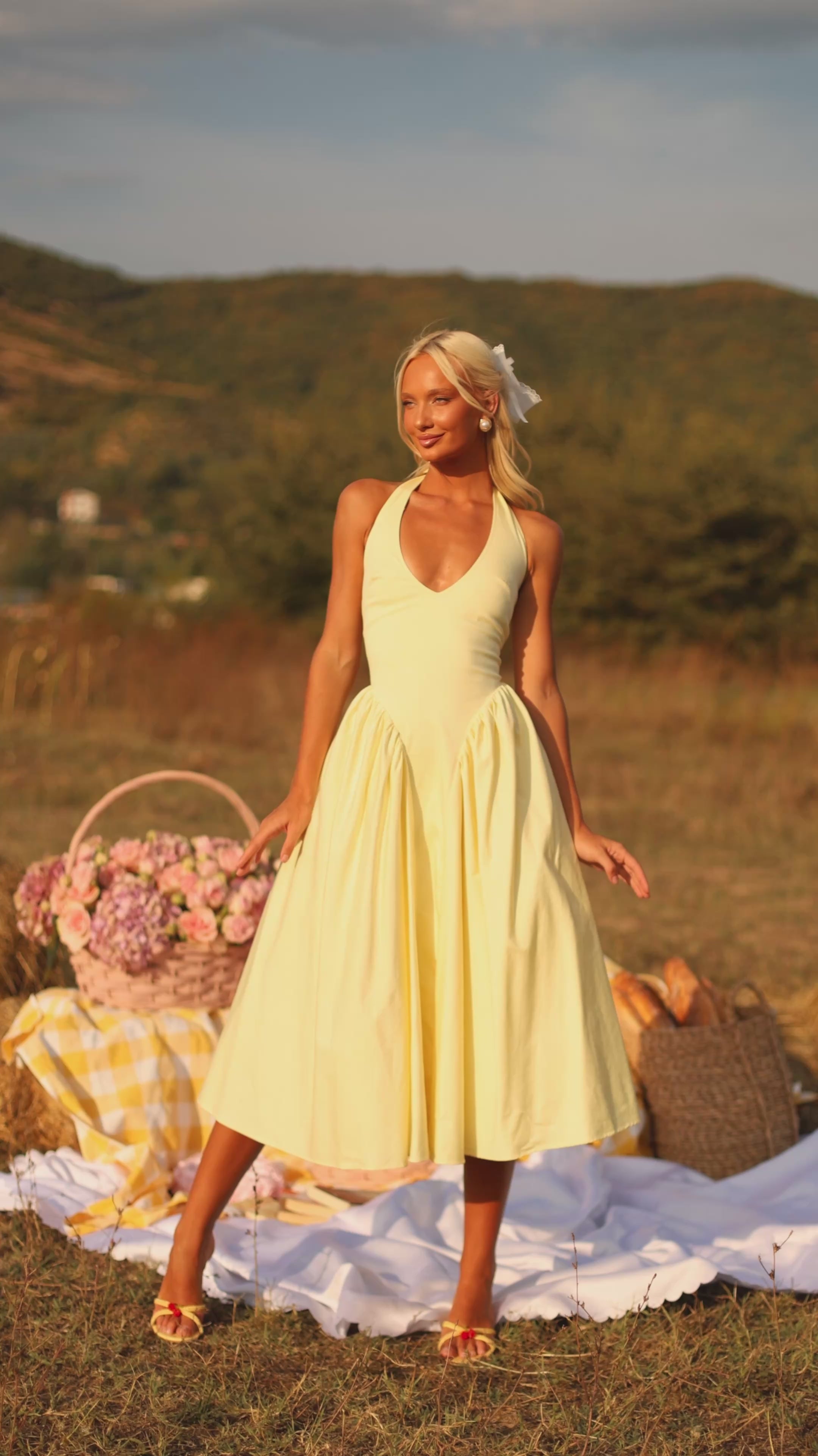 Buttercream Yellow halter midi dress with fitted waist 