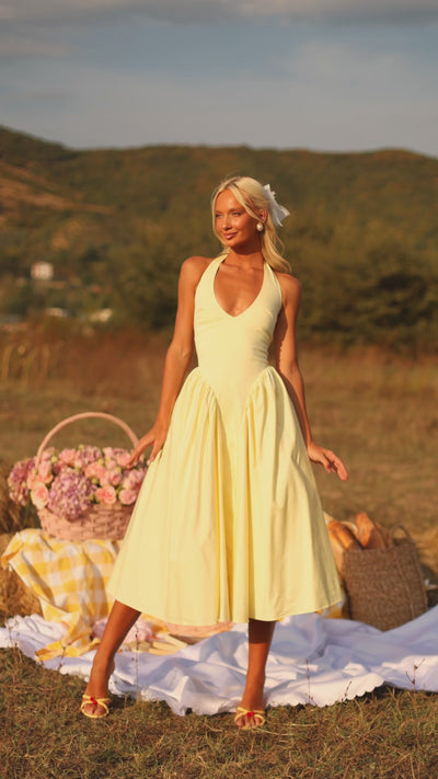 Buttercream Yellow halter midi dress with fitted waist 